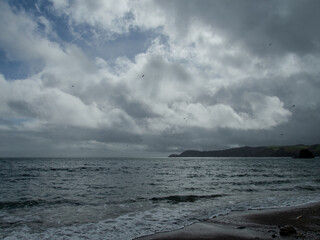 dramatic sky and cornish seascape.