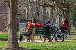 LYON, FRANCE, March 16, 2024 : Bikers rest in the city park