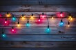 christmas lights are on a wooden wall