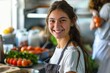 Cheerful young girl with an apron stands in a vibrant kitchen, surrounded by fresh ingredients