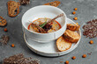Mushroom cream soup on dark background. Champignon soup