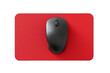 A computer mouse perched atop a vibrant red mouse pad