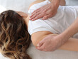 Woman having Chiropractic back adjustment. Osteopathy, Physiotherapy, Sport Injury rehabilitation, Scoliosis posture correction