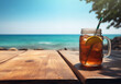 ©  Princess Turandot - Iced Tea in a Pint Glass Against the Backdrop of a Seascape. Conjures a Refreshing and Relaxing Atmosphere, Ideal for Promoting Beachside Cafes, Coastal Resorts, or Summer Beverage Specials