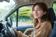 © AiPhoto - 運転する女性