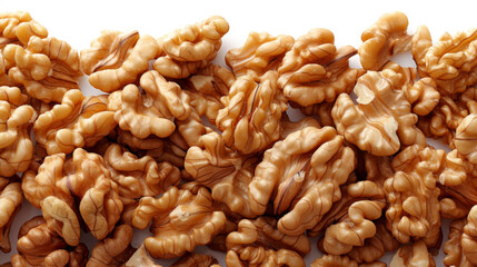 Walnuts stacked on a white table