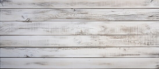 Canvas Print - A detailed shot of a white hardwood wall featuring rectangular planks arranged in a parallel pattern. The wood stain enhances the natural beauty of the composite material