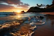 Dusk falls as the sun sets over the ocean, waves crash on the beach
