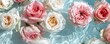 Assortment of fresh roses floating in water