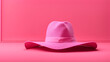 © Jati - Chic Woman Pink Hat on Clean Background for Fashion and Sunscreen Ads