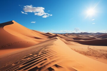 Wall Mural - A dune in the erg, with the sun breaking through the clouds in the desert sky