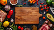 Empty wooden cutting board with meat and vegetables surrounding it. Food background.