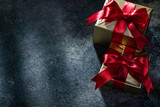 Fototapeta  - Gift Boxes On Dark Background With Freespace