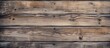 A close up of a wooden wall with multiple timber planks