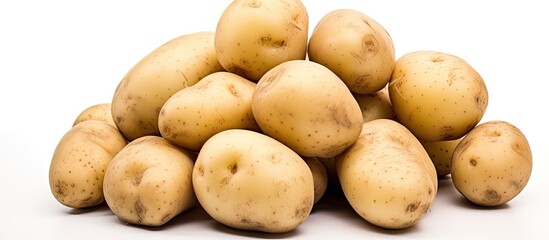 Wall Mural - A pile of potatoes on white background