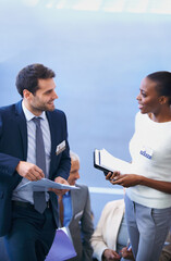 Fototapete - Coworkers, seminar and diversity talking with documents, information and discussion with journalists. Happy, people smile for corporate company in press release, collaboration and conversation