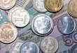 Russian ruble Russian rubles in coins on banknotes background.