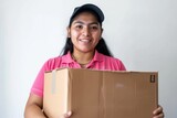 Fototapeta Do akwarium - a colombian woman logistic staff wearing shirt holding a big cardboard package, white background