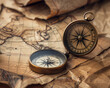 A compass on a vintage map
