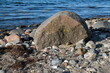 FU 2022-07-28 EckSchleswig 1039 Im Sand liegen Steine