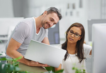 Leinwandbilder - Business people, laptop and teamwork with conversation, planning or PR consultant with agency. Staff, man or woman with computer or online reading for company blog or news with feedback or web design