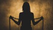 A woman's silhouette with chains around her wrists, symbolizing the captivity and oppression faced by victims.