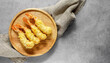 Fried shrimp. top view shot of fried shrimp, tempura on wooden board, japanese food, copy space