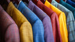 A row of colorful jackets hanging on a rack. The jackets are of different colors and styles, and they are all neatly hung up. Concept of organization and attention to detail