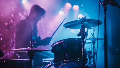 Wall Mural - A musician is playing a purple membranophone on stage in front of a microphone at a concert. The performing arts entertainment is filled with music artist talent in violet hues