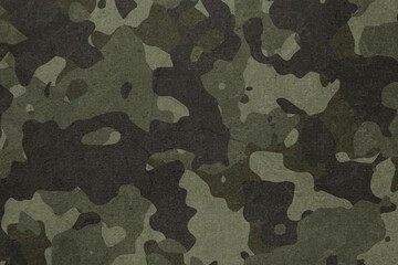Wall Mural - texture of military dirty camouflage fabric. combat protective camouflage for background
