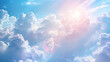Background of fluffy bluish clouds with sun in the background