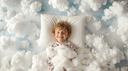 Wall Mural - happy smiling little boy child in pajamas sleeping on white clouds in the sky, top view. healthy pleasant children's sleephappy smiling little boy child in pajamas sleeping on white clouds in the sky
