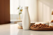 Crafting almond milk, showcasing the delicate process of turning almonds into a creamy, plant-based beverage. A modern kitchen with a blend of almonds and sleek equipment.