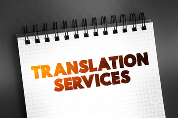 Poster - Translation Services text on notepad, business concept background