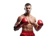 © Fotograf - A man wearing boxing gloves posing for a picture. Suitable for sports and fitness concepts