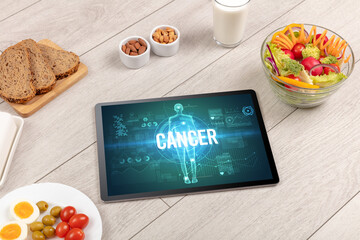 Canvas Print - Tablet Pc with fruits, medical concept concept