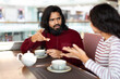 © Prostock-studio - emotional young indian couple have fight at cafe