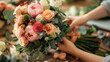 Florist crafting elegant bouquet with fresh flowers. Close-up of a florist's hands arranging a colorful bouquet with various blooms and greenery