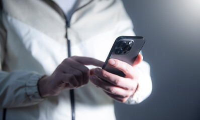 Sticker - Close-up photo of male hands with smartphone