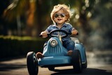 Fototapeta  - Miniature Small boy riding car speed. Big automobile. Generate Ai