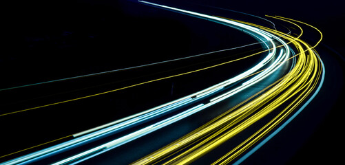 lights of cars driving at night. long exposure