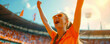 Dutch football soccer female fan in a stadium supporting the national team, Oranje 
