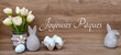 Carte de vœux Joyeuses Pâques : œufs de Pâques et lapin de Pâques avec le message de Pâques Joyeuses Pâques.