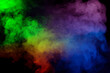 © Nikolay - Blue and yellow steam on a black background.