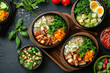 A healthy meal delivery service with pre-portioned ingredients and recipes. Various food ingredients and dishes are placed in bowls on the table