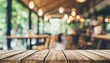 empty wood table top with blurred bokeh cafe background blurred coffee shop interior background