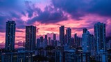Fototapeta Miasto - Majestic purple and orange sunset over a bustling cityscape with towering skyscrapers