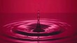 a drop of water that is in the middle of a red liquid filled with a drop of water that is in the middle of the water.