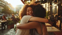 beautiful women giving each other a greeting hug in a restaurant or cafe during the day and very happy in high resolution
