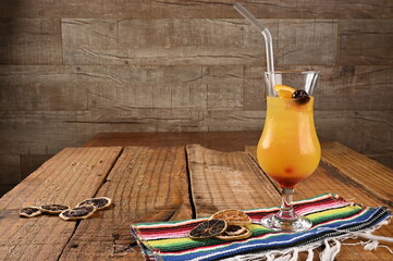 Wall Mural - fruit tasty tropical tequila sunrise drink refreshing alcoholic drink..